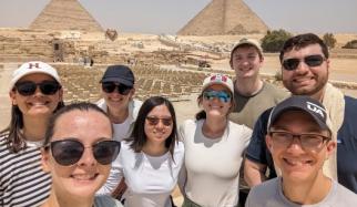 Students in front of Egyptian pyramids